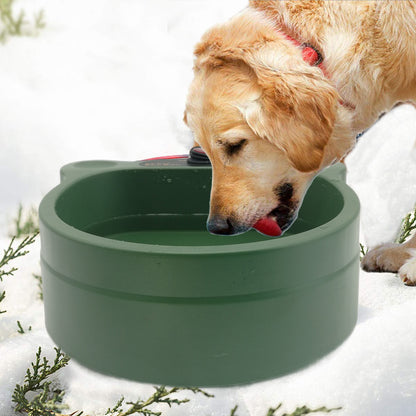dog eating from outdoor heated food water bowl winter weather